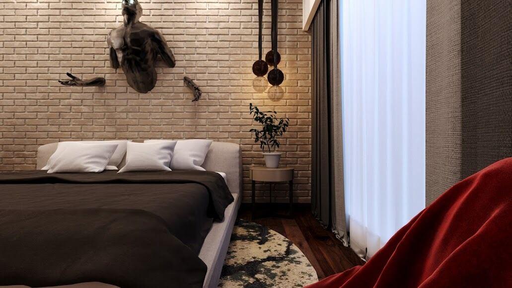 Bedroom with brick wall and floating bed