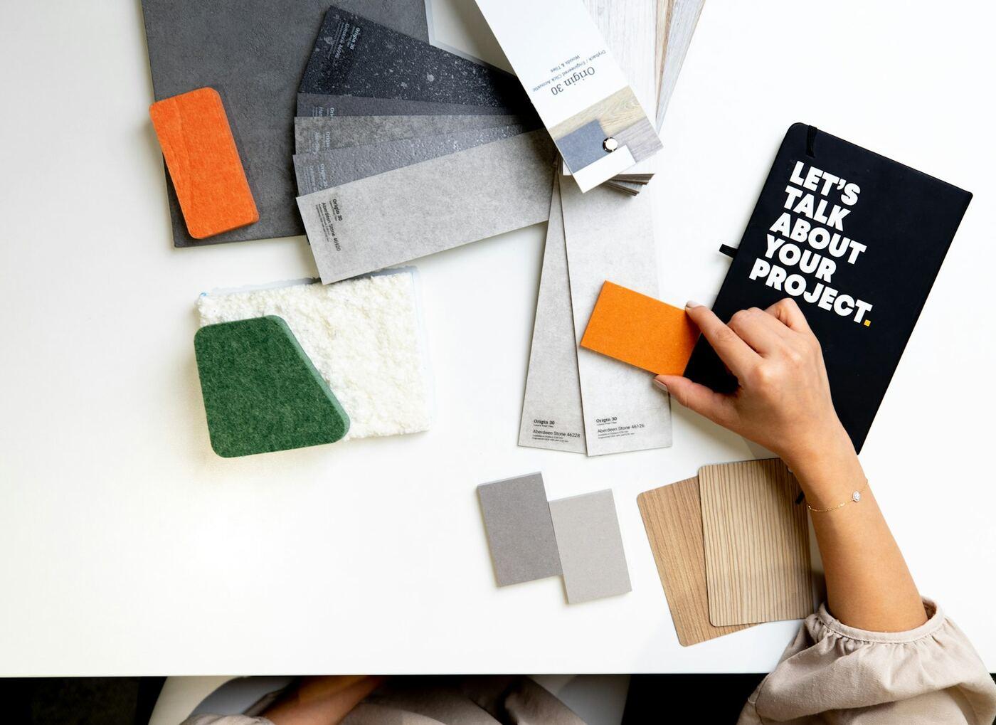 Material and colour samples laid out on a designer’s desk