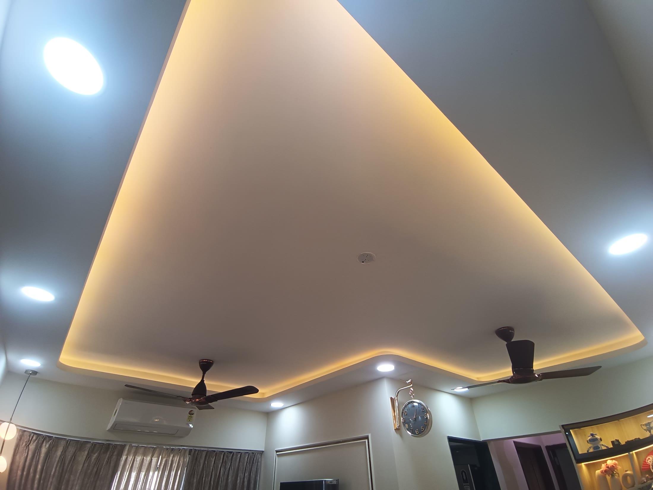 False ceiling with a large curved cove and concealed lighting