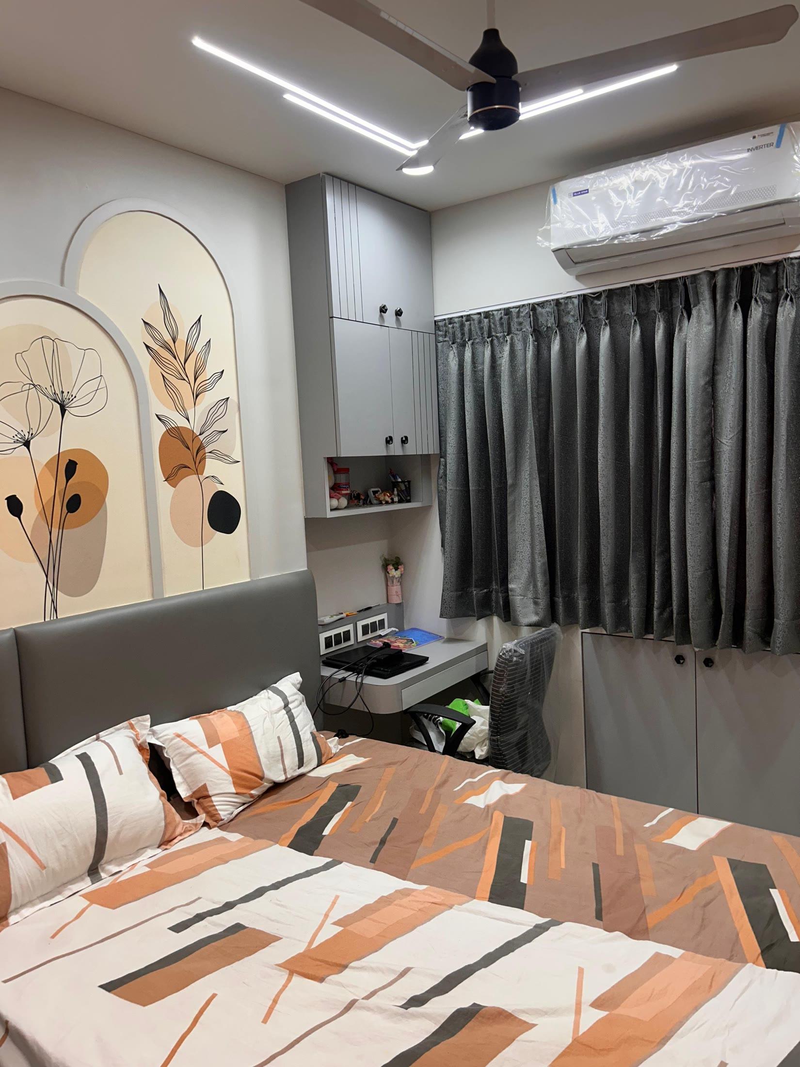 Bedroom with a study ledge set into the storage beside the bed