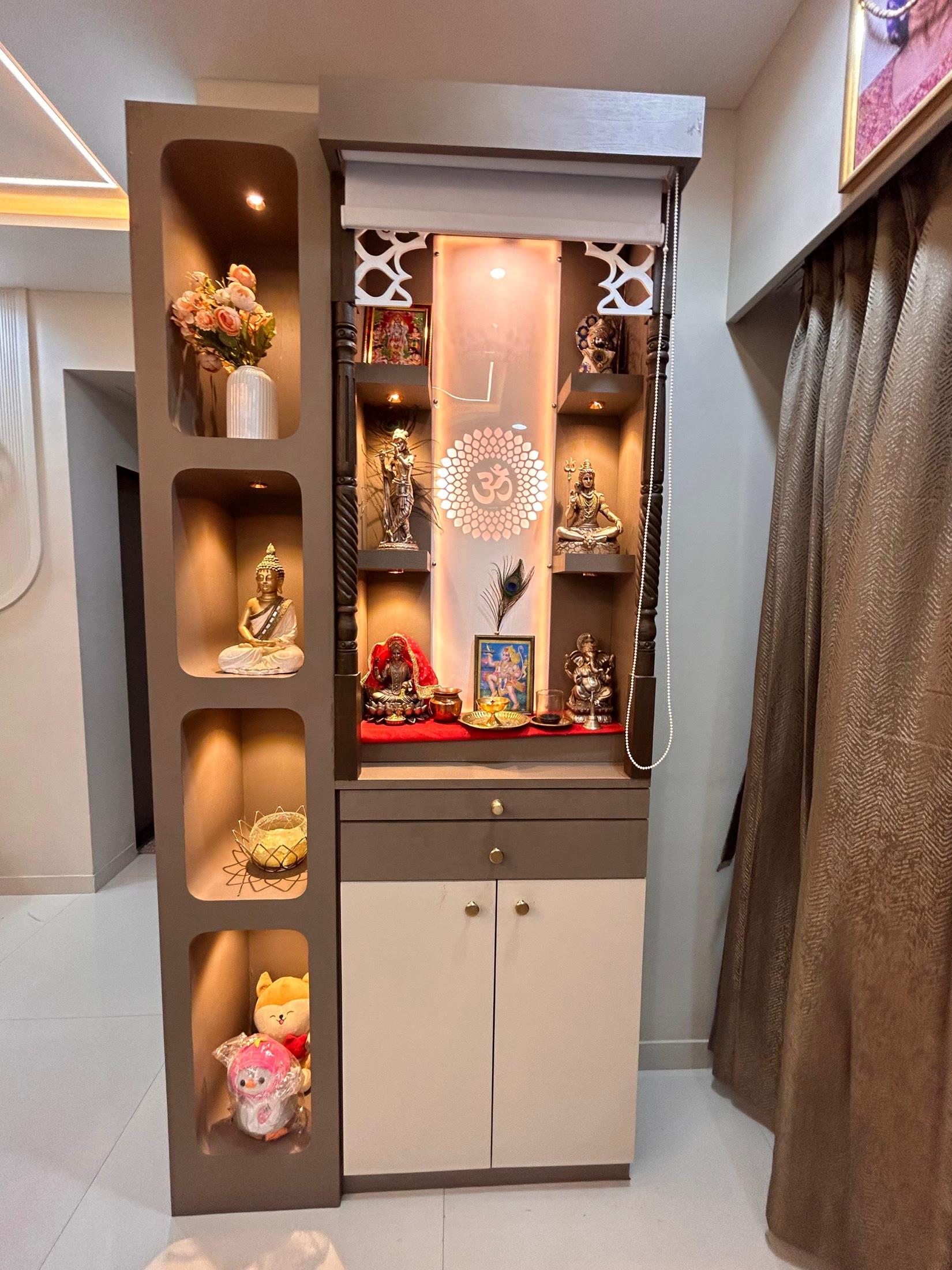 Pooja unit seen wider, with the niche column and curtain alongside