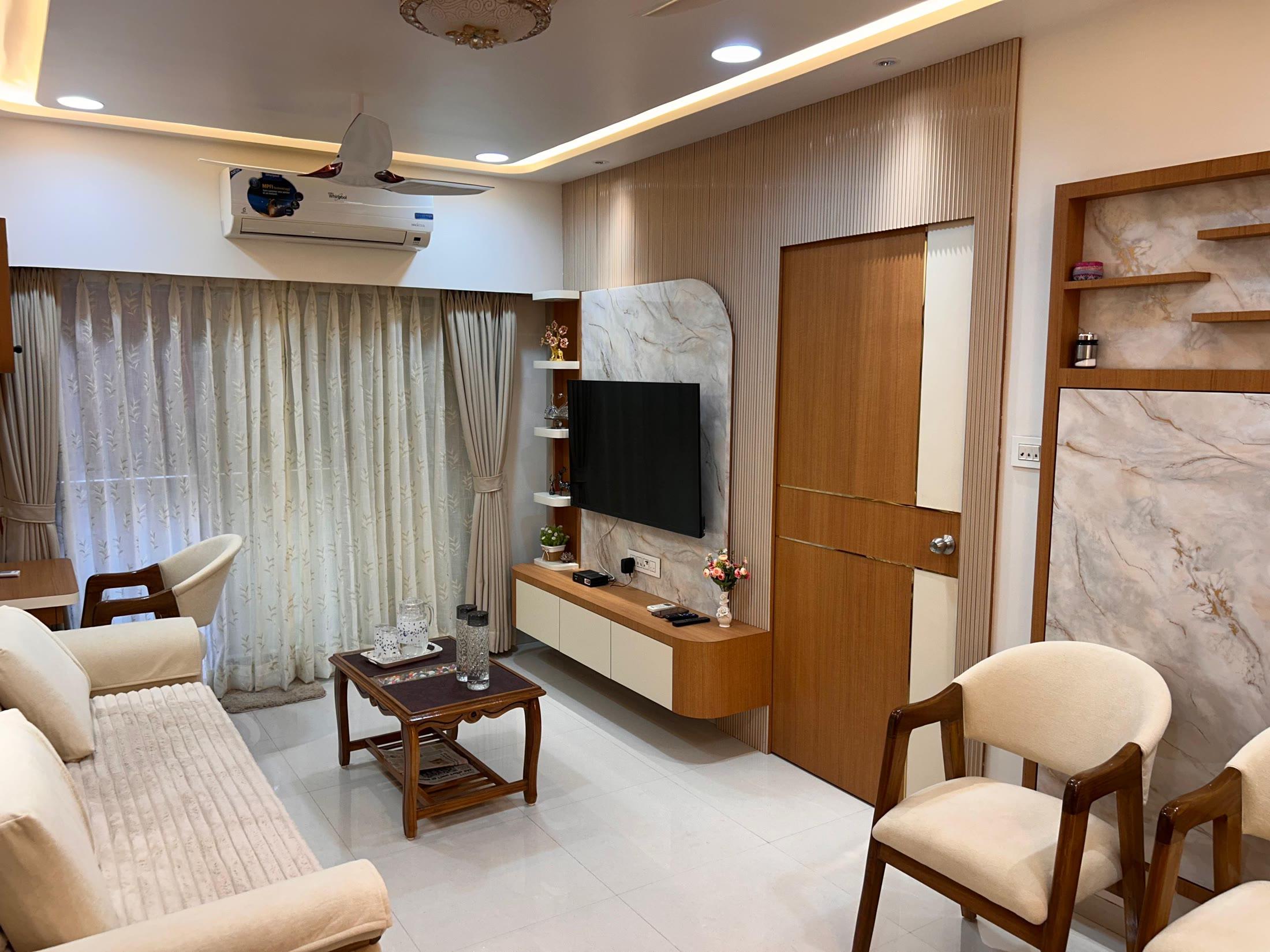 Living room from the seating side, looking towards the marble media wall